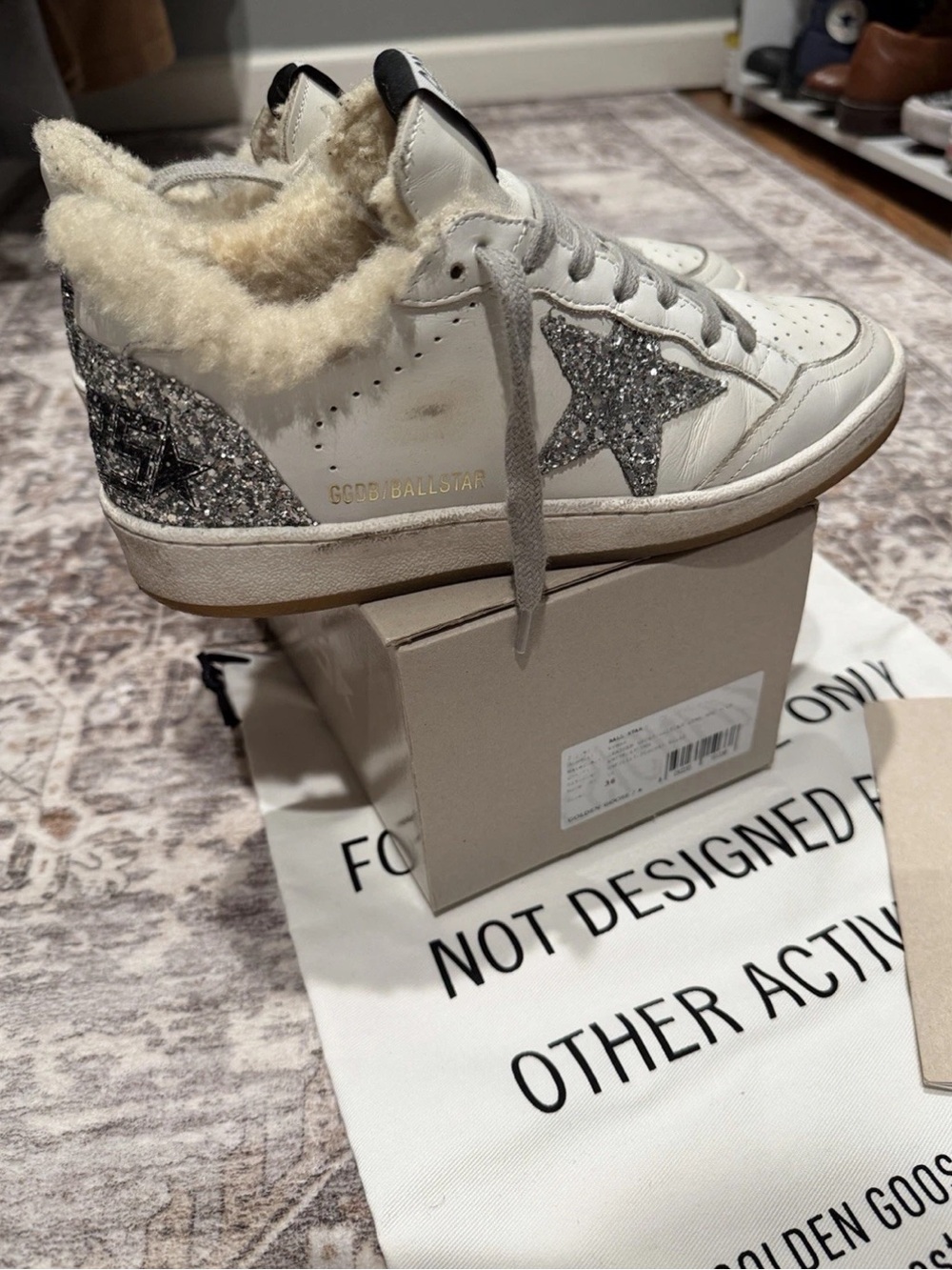 Golden Goose womens White Leather Shearling Sneakers with Silver Glitter Star